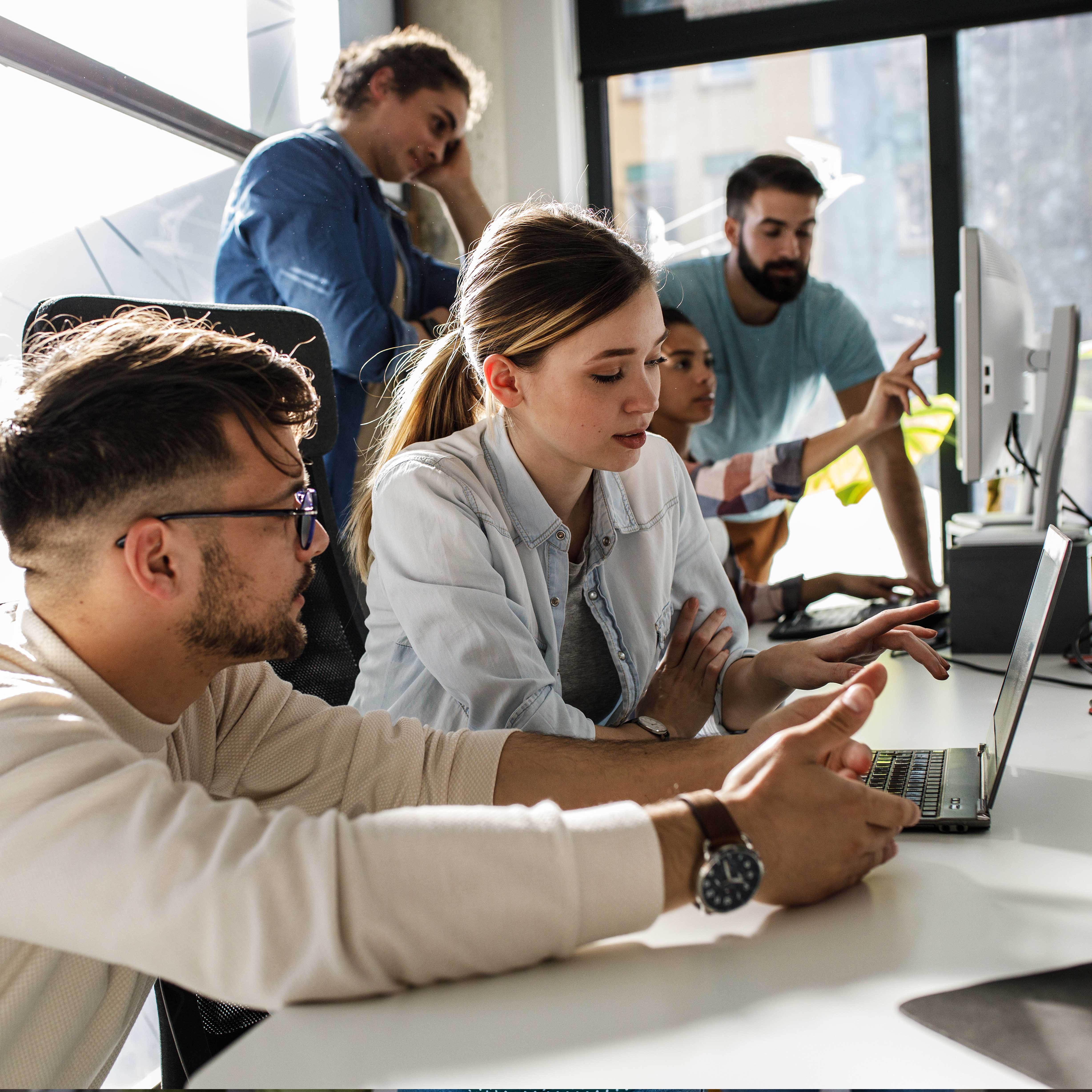 Screaming businessman drowning under a lot of paperwork